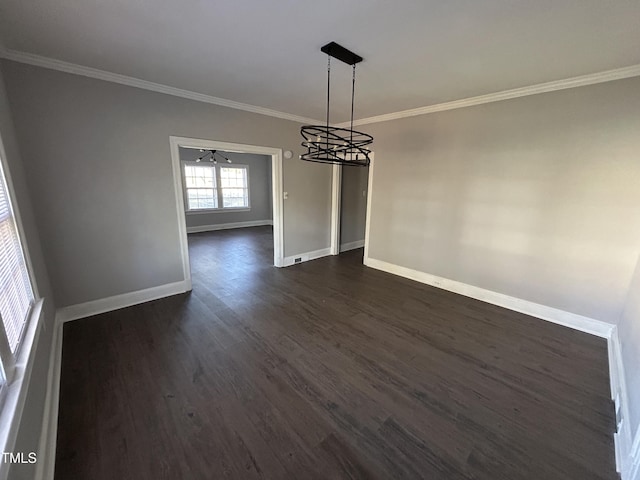 unfurnished dining area featuring a chandelier, crown molding, and dark wood-type flooring