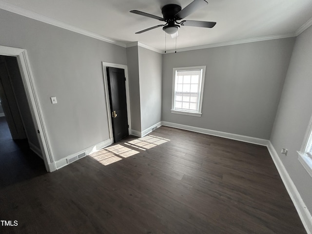 unfurnished room with dark hardwood / wood-style floors, ceiling fan, and ornamental molding