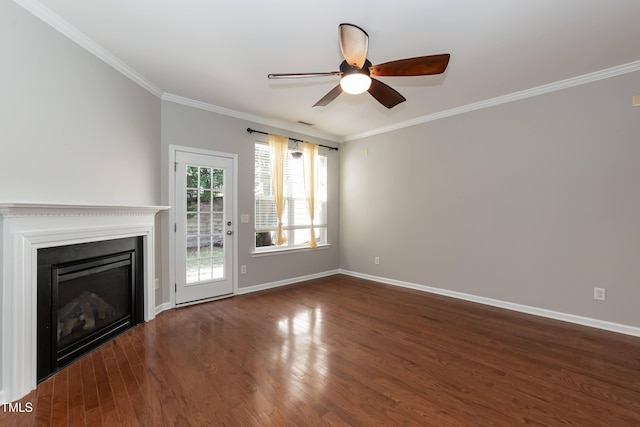 unfurnished living room featuring dark hardwood / wood-style floors, ceiling fan, and ornamental molding