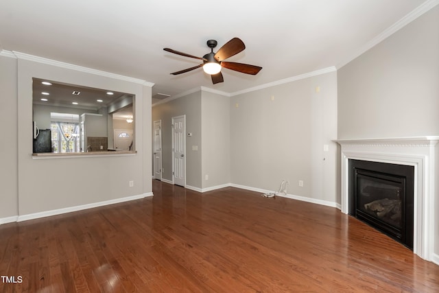 unfurnished living room with dark hardwood / wood-style floors, ceiling fan, and ornamental molding