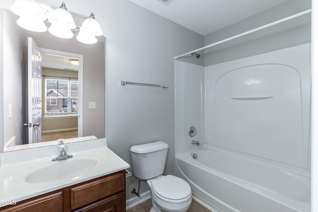 full bathroom with bathtub / shower combination, vanity, and toilet