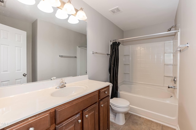 full bathroom with tile patterned flooring, vanity, toilet, and shower / bath combo with shower curtain