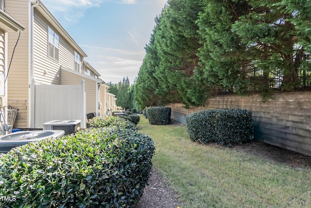 view of yard featuring central AC