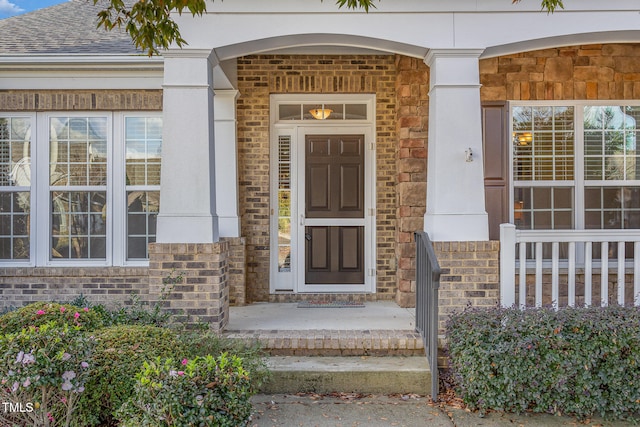 doorway to property featuring a porch