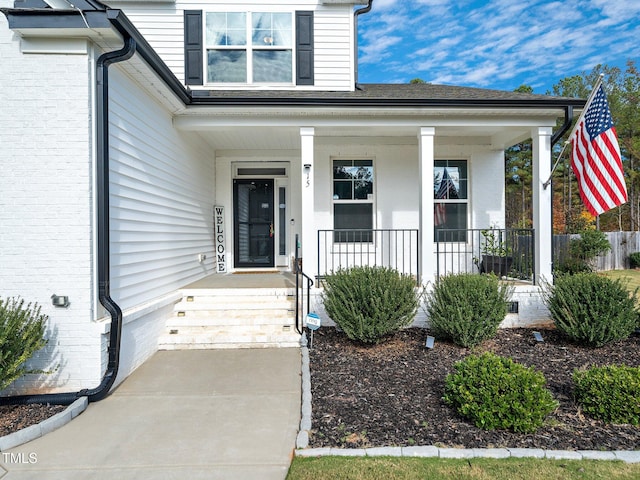 entrance to property with covered porch