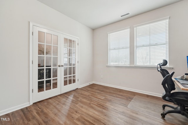 office area featuring french doors and hardwood / wood-style flooring