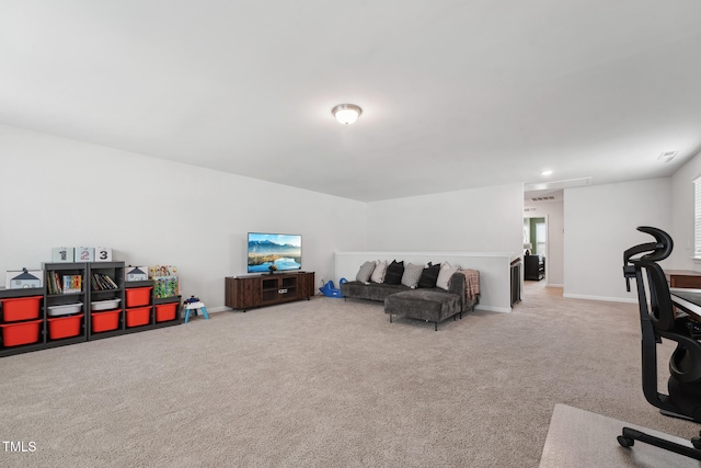 living room featuring light carpet