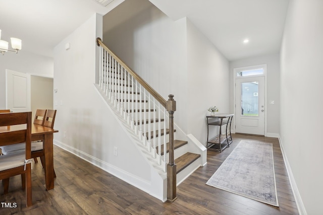 entrance foyer featuring dark hardwood / wood-style flooring