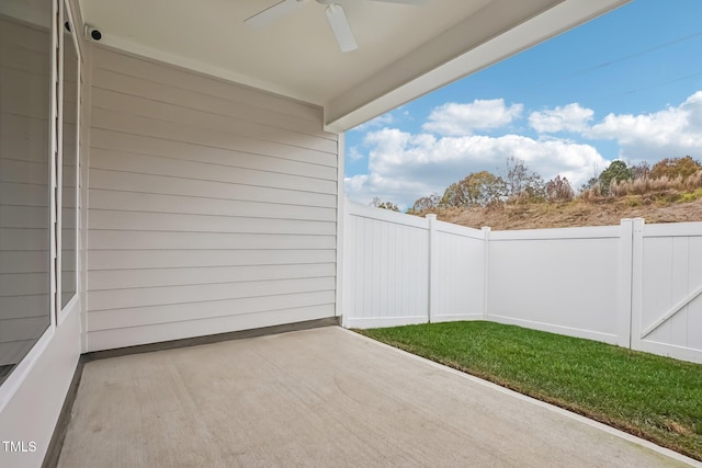 view of patio featuring ceiling fan