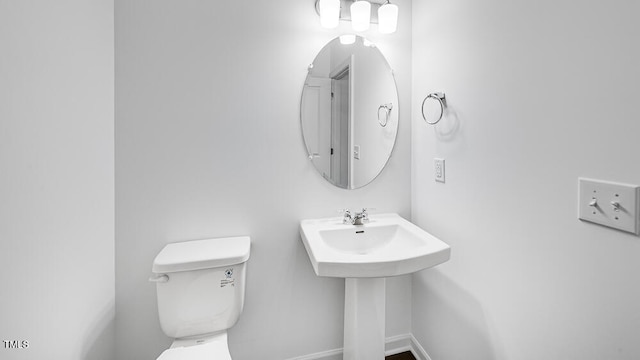 657 Sun Meadow Dr, Wake Forest, NC 27587 - bathroom with baseboards and toilet