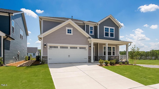 657 Sun Meadow Dr, Wake Forest, NC 27587 - craftsman house with covered porch, stone siding, and a front yard