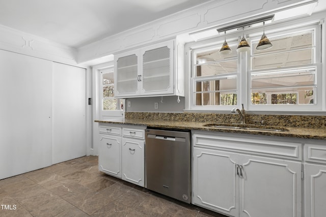 kitchen featuring sink, a healthy amount of sunlight, white cabinets, pendant lighting, and dishwasher