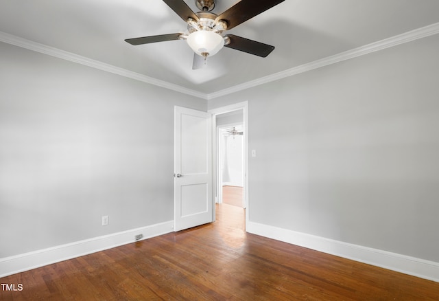 unfurnished room featuring hardwood / wood-style flooring, ceiling fan, and crown molding