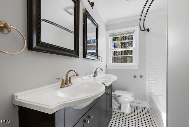 full bathroom featuring vanity, toilet, shower / bathing tub combination, and crown molding