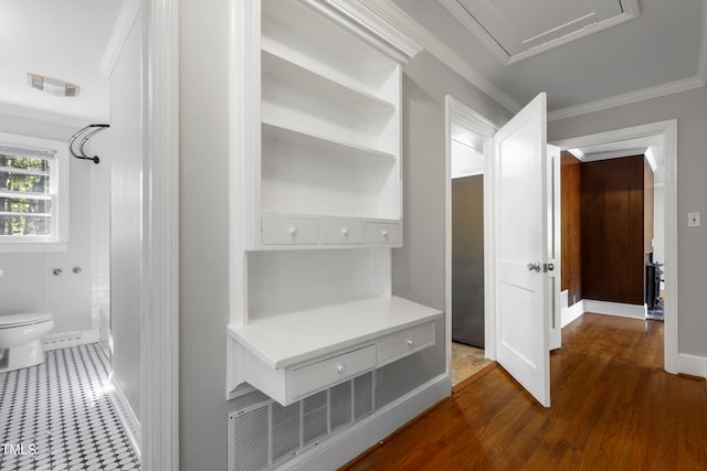 mudroom featuring dark hardwood / wood-style floors and crown molding