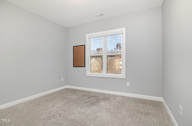 view of carpeted spare room