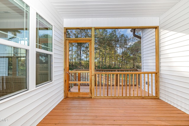 unfurnished sunroom featuring plenty of natural light