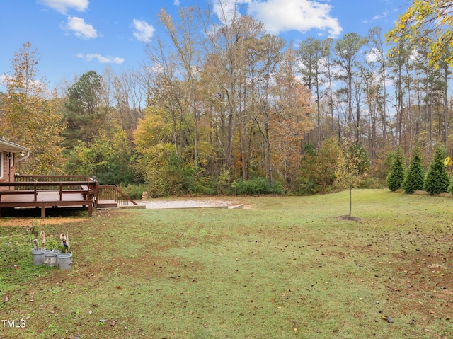 view of yard featuring a deck