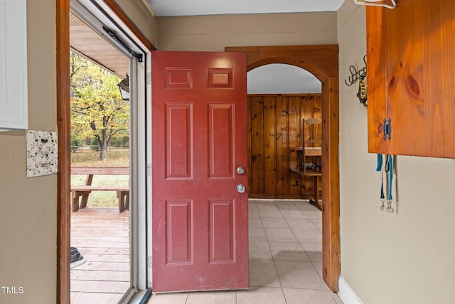 foyer entrance with light tile patterned floors