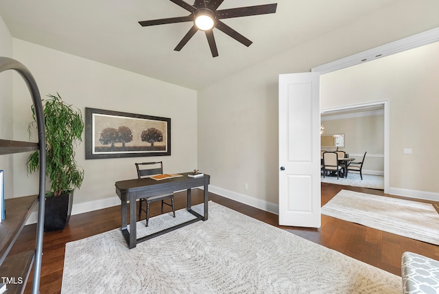 office space with ceiling fan and dark hardwood / wood-style flooring