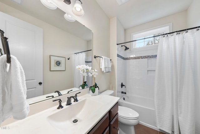 full bathroom featuring shower / bathtub combination with curtain, tile patterned flooring, vanity, and toilet