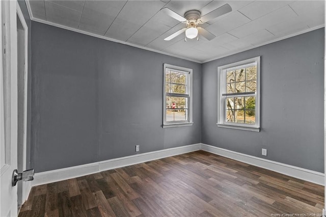 spare room featuring hardwood / wood-style floors, ceiling fan, and crown molding