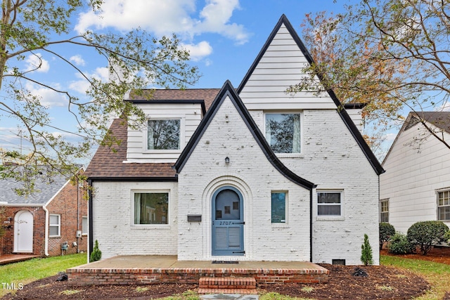 view of tudor-style house