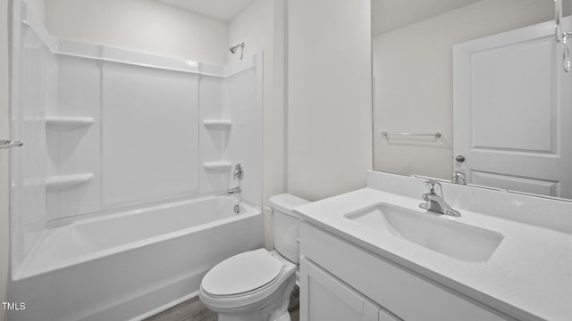 full bathroom featuring vanity, shower / tub combination, toilet, and wood-type flooring