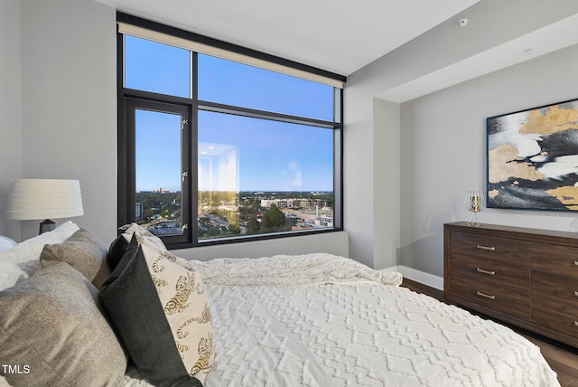 bedroom featuring wood-type flooring