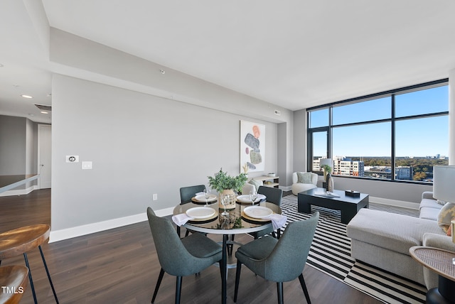 dining room featuring dark hardwood / wood-style flooring