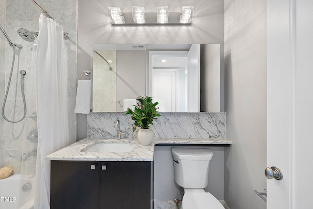 full bathroom featuring tasteful backsplash, vanity, shower / bath combination with curtain, and toilet