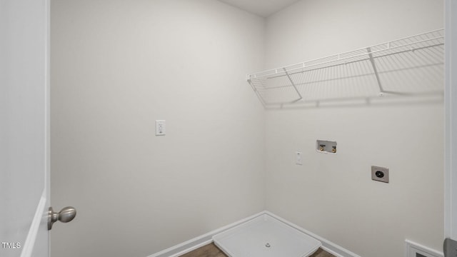 236 Holton St, Smithfield, NC 27577 - washroom with hookup for a washing machine, electric dryer hookup, and baseboards