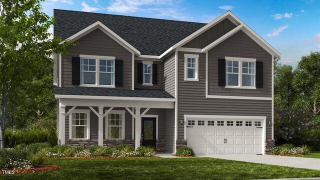 904 Delano Dr, Knightdale, NC 27545 - craftsman-style home featuring covered porch, roof with shingles, driveway, a garage, and a front lawn