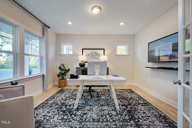 904 Delano Dr, Knightdale, NC 27545 - home office with light wood-type flooring, baseboards, and recessed lighting