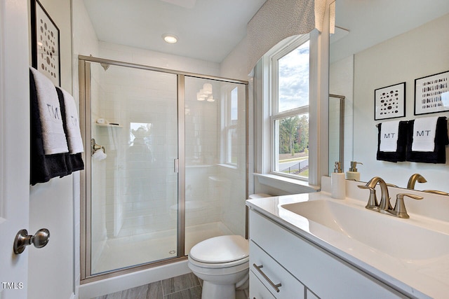 904 Delano Dr, Knightdale, NC 27545 - full bathroom featuring a shower stall, toilet, vanity, and recessed lighting