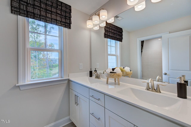 904 Delano Dr, Knightdale, NC 27545 - bathroom featuring double vanity and curtained shower