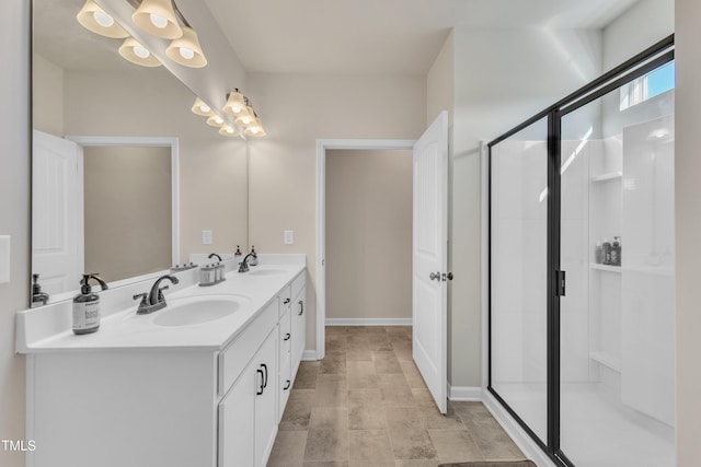 bathroom with vanity and walk in shower