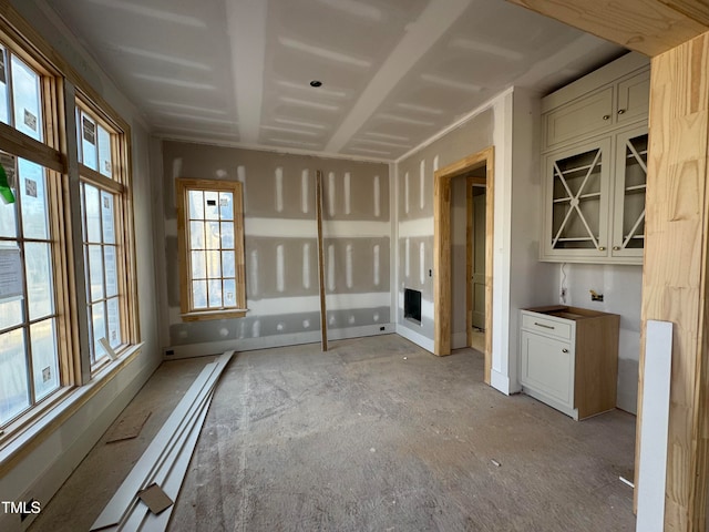 interior space with cream cabinets