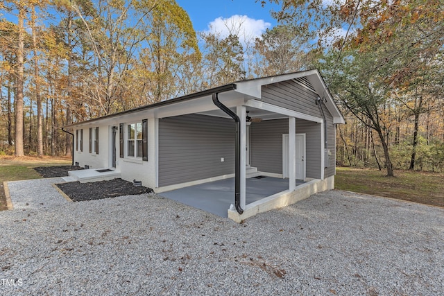 1518 Parks Village Rd, Zebulon, NC 27597 - view of property exterior with a patio