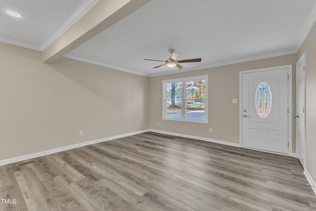 1518 Parks Village Rd, Zebulon, NC 27597 - foyer entrance with ceiling fan, light hardwood / wood-style floors, and ornamental molding