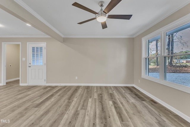 1518 Parks Village Rd, Zebulon, NC 27597 - empty room featuring ceiling fan, light hardwood / wood-style flooring, and crown molding