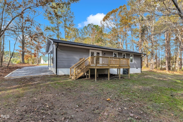 1518 Parks Village Rd, Zebulon, NC 27597 - rear view of house featuring a wooden deck