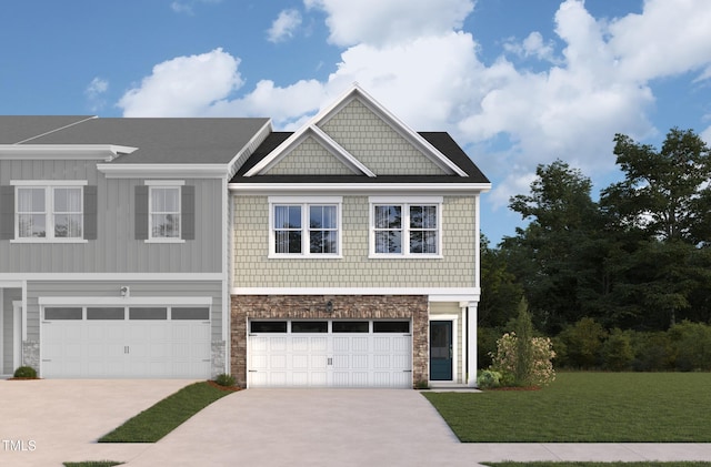 view of front facade with a garage and a front lawn