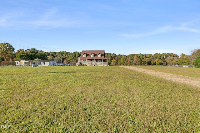 view of front of property featuring a rural view