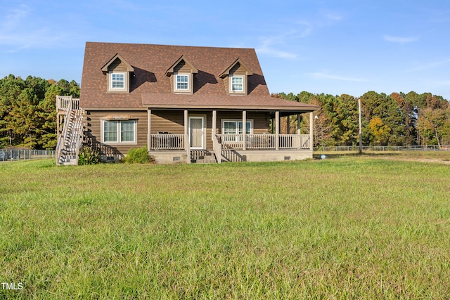 view of front of house with a front lawn and a porch