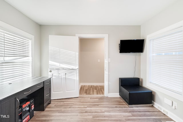 home office featuring light wood-type flooring