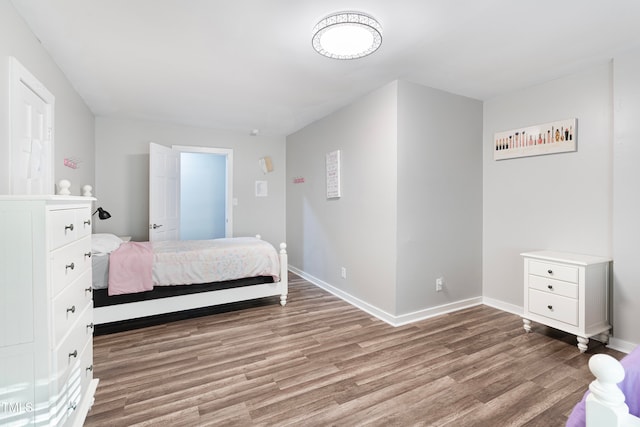 bedroom featuring hardwood / wood-style floors