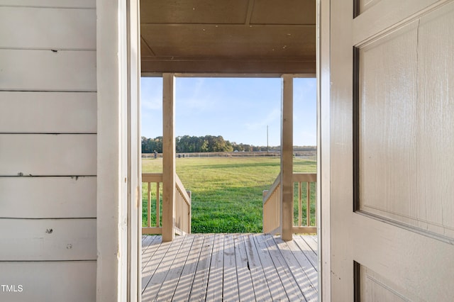 doorway to outside with a rural view