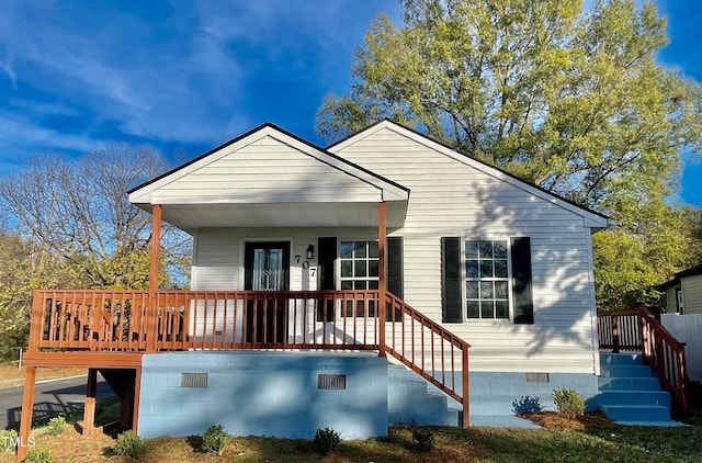 view of front of home featuring covered porch