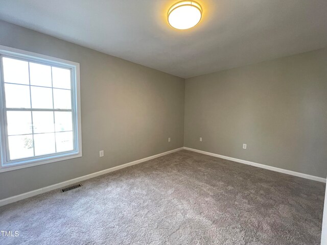 empty room with carpet floors